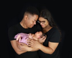 Shooting photo avec bébé Bébé dans les bras des parents