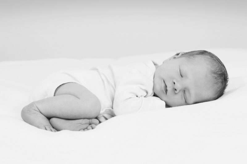 Position bébé séance photo réalisé par un profesionnel
